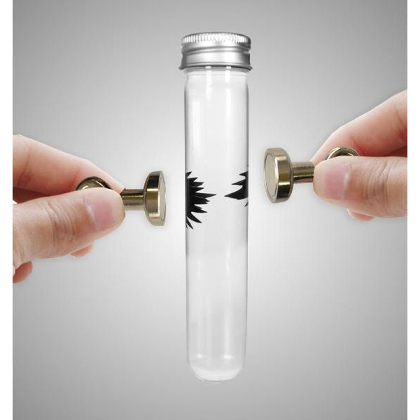 Ferromagnetic Fluid in a test tube.